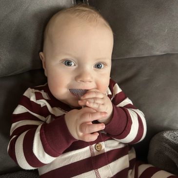 Cheerful infant smiling